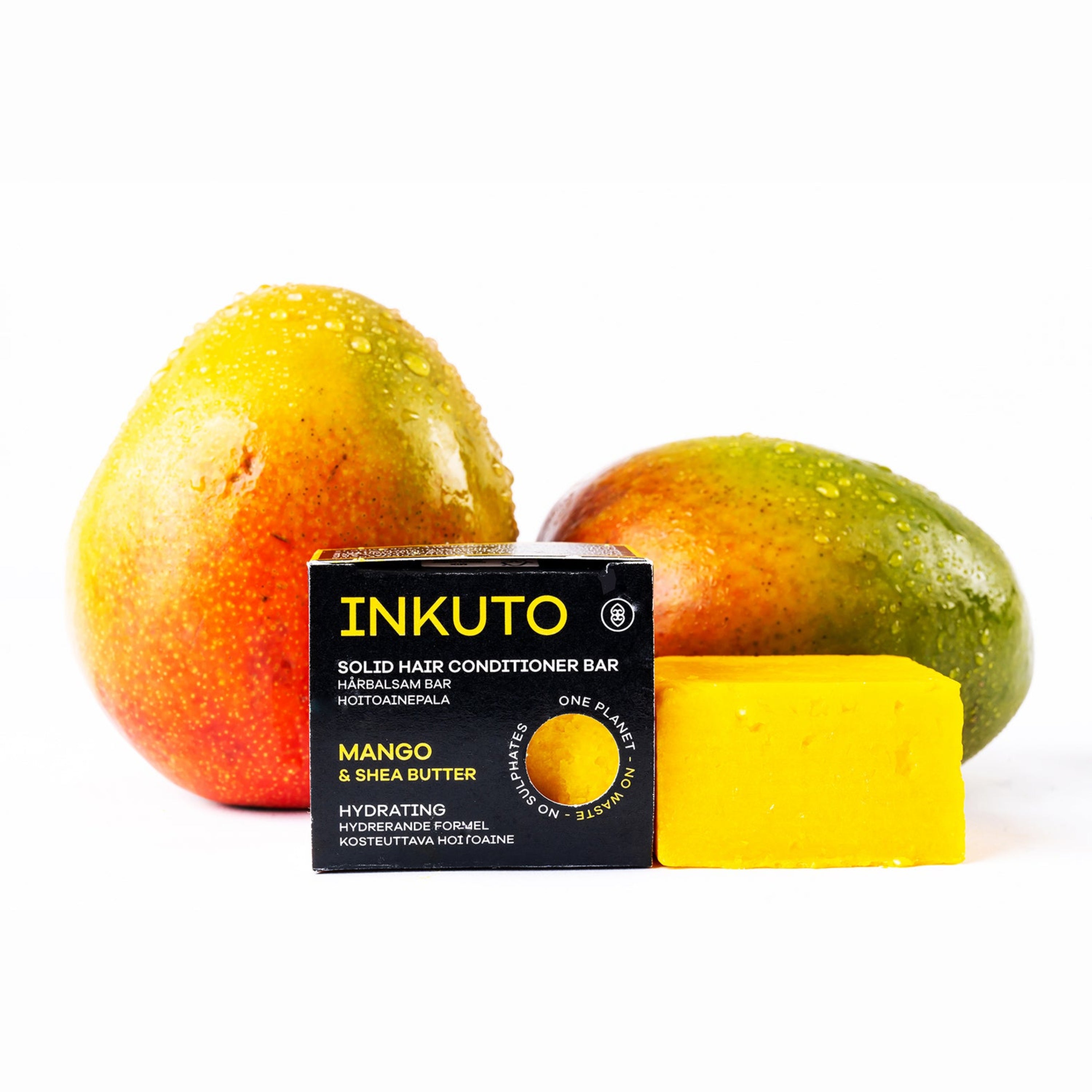 Inkuto solid hair conditioner bar with mangoes on a white background