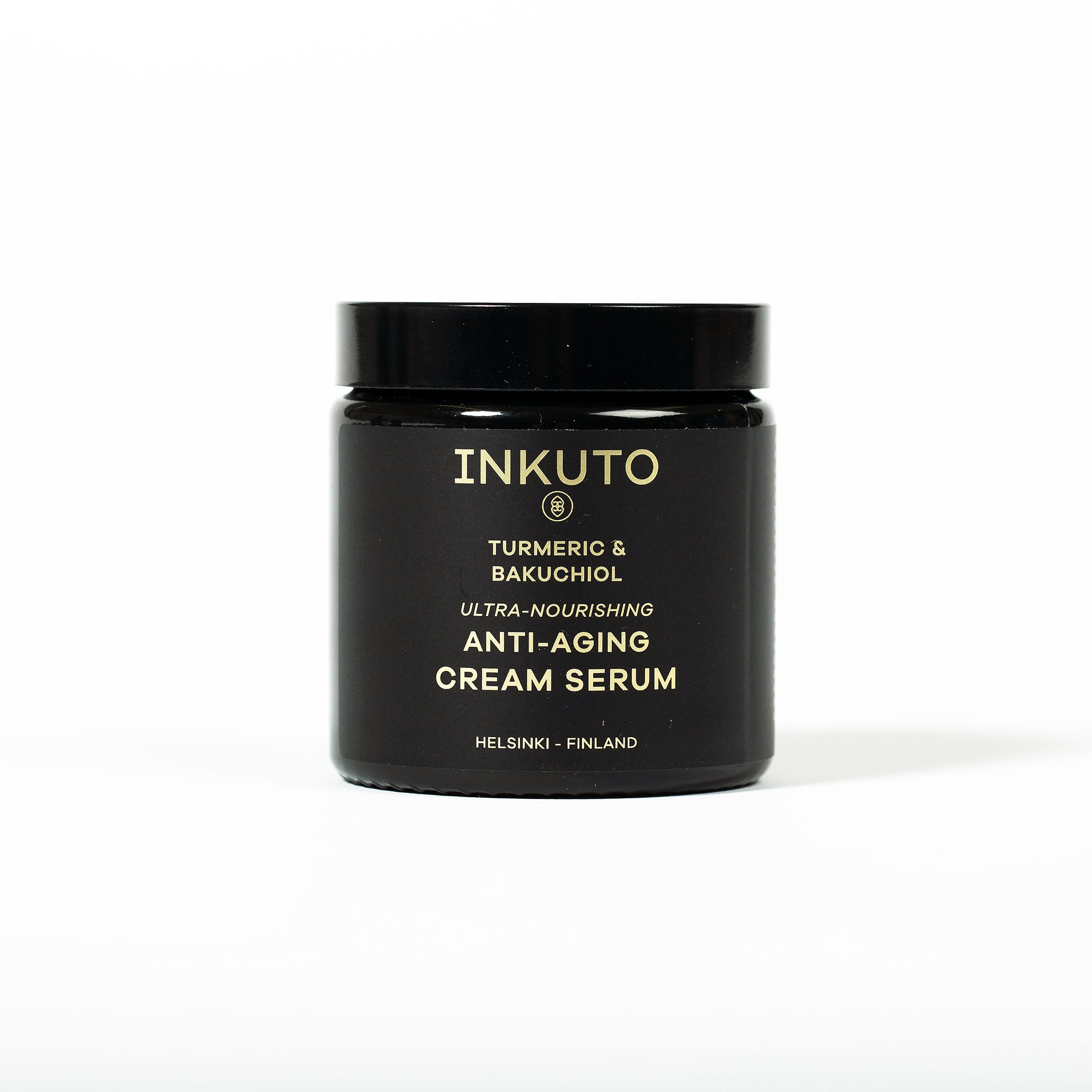 A black jar of INKUTO Turmeric & Bakuchiol Ultra Nourishing Anti-Aging Cream Serum on a white background.