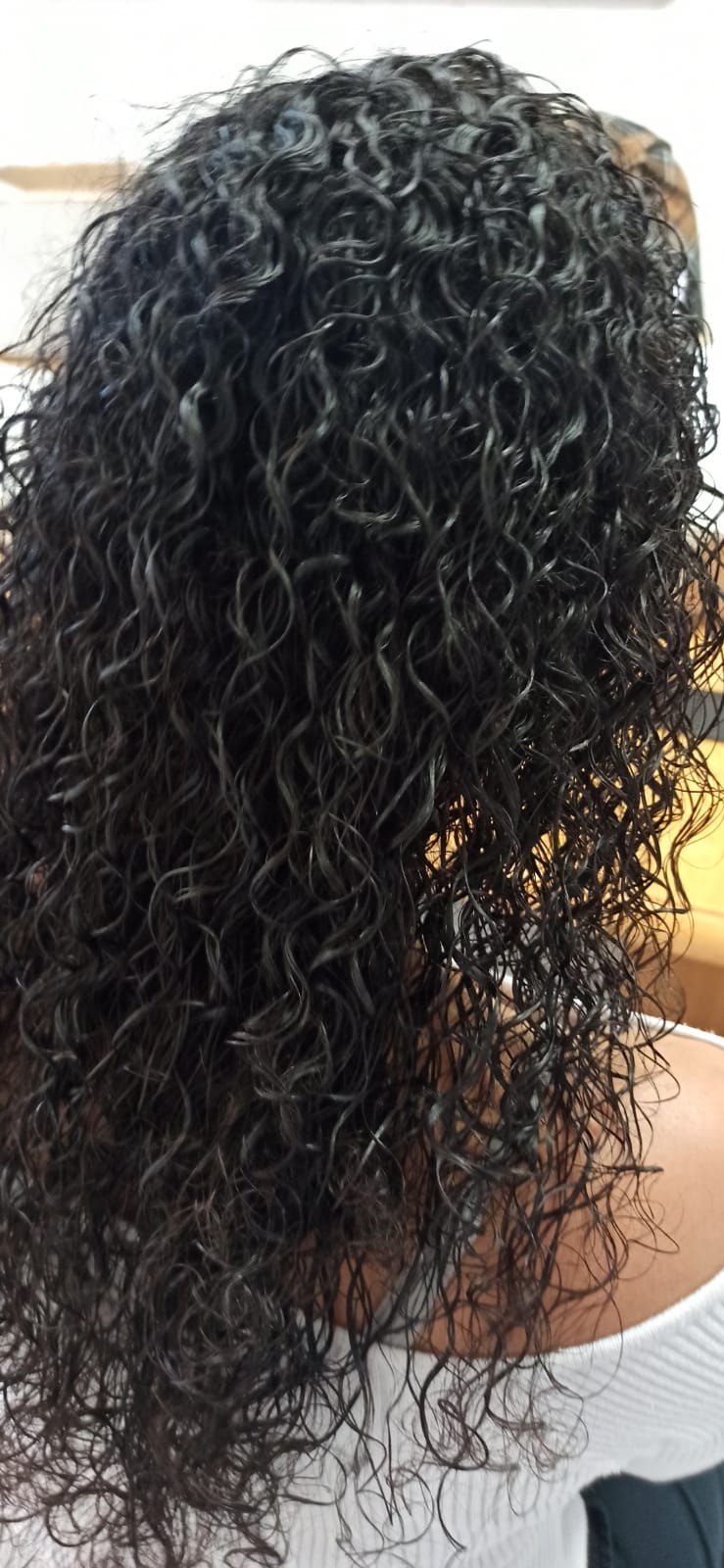 Inkuto Curl Amplifier Styling Cream product with textured natural curls